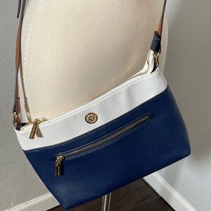 Women’s Anne Klein pebbled texture navy blue and white crossbody bag.